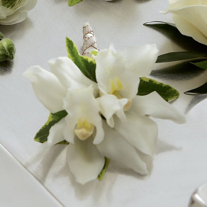 White Mini Cymbidium Boutonniere –  Netcong Village Florist, Netcong NJ